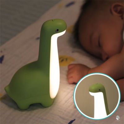veilleuse-bebe-dinosaure-vert-cou-eclairer