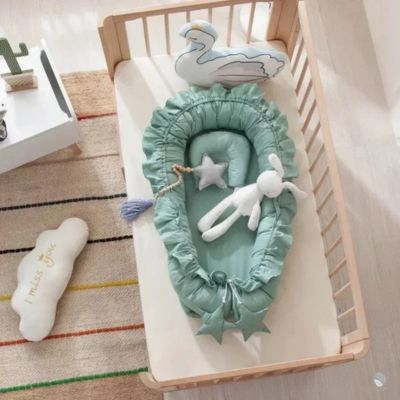 reducteur-de-lit-bebe-cocon-vert