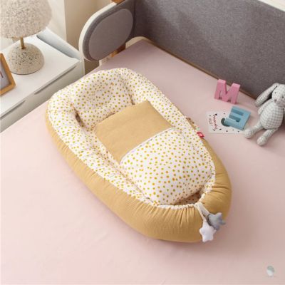 reducteur-de-lit-bebe-mimosa-cocon-protecteur