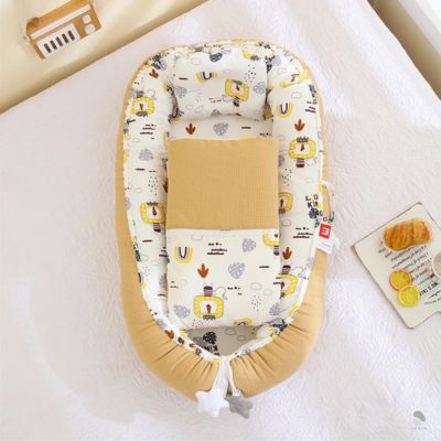 reducteur-de-lit-bebe-mimosa-lion-avec-couette